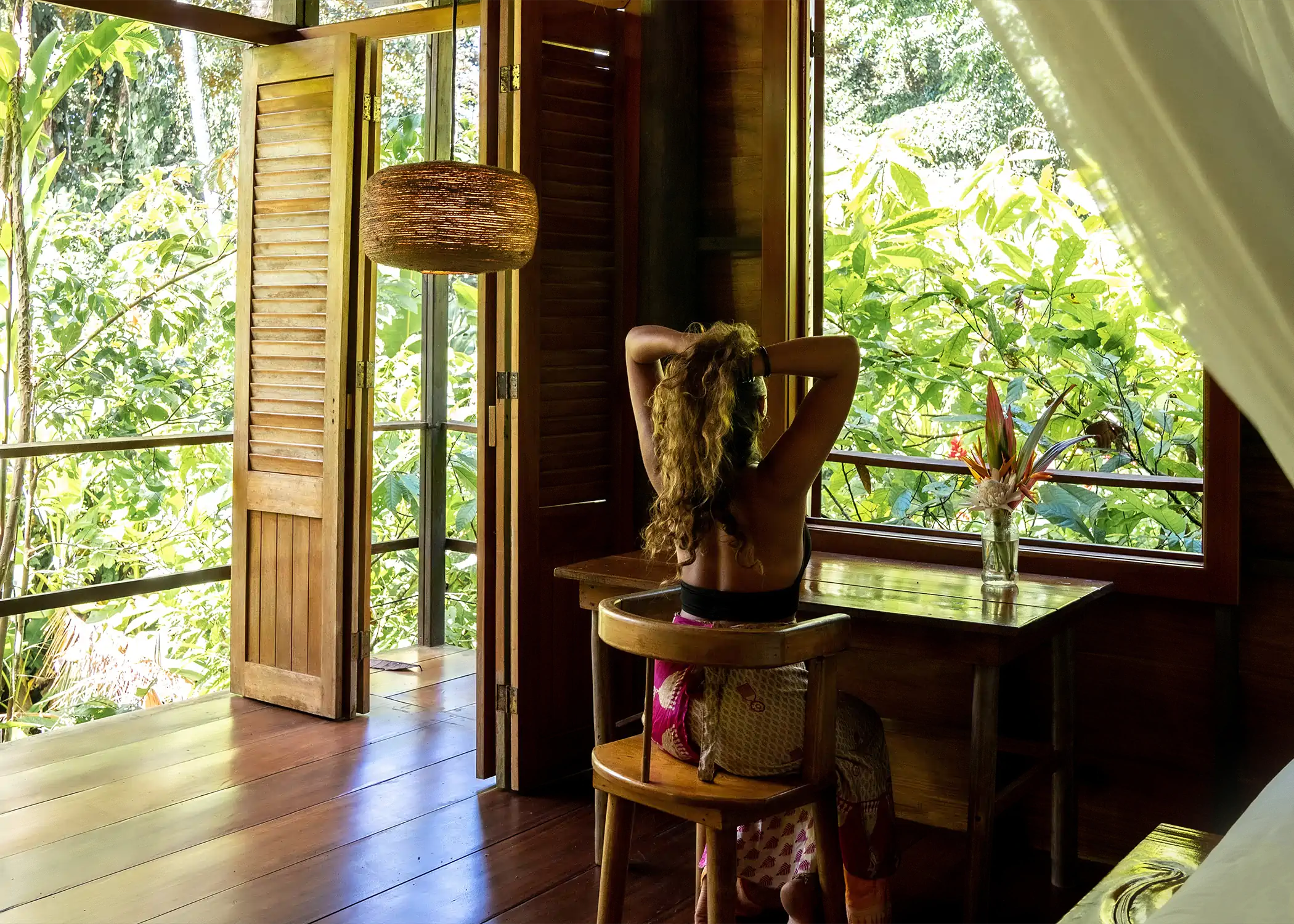 Private bedroom workspace with jungle views at Cacao Farm House