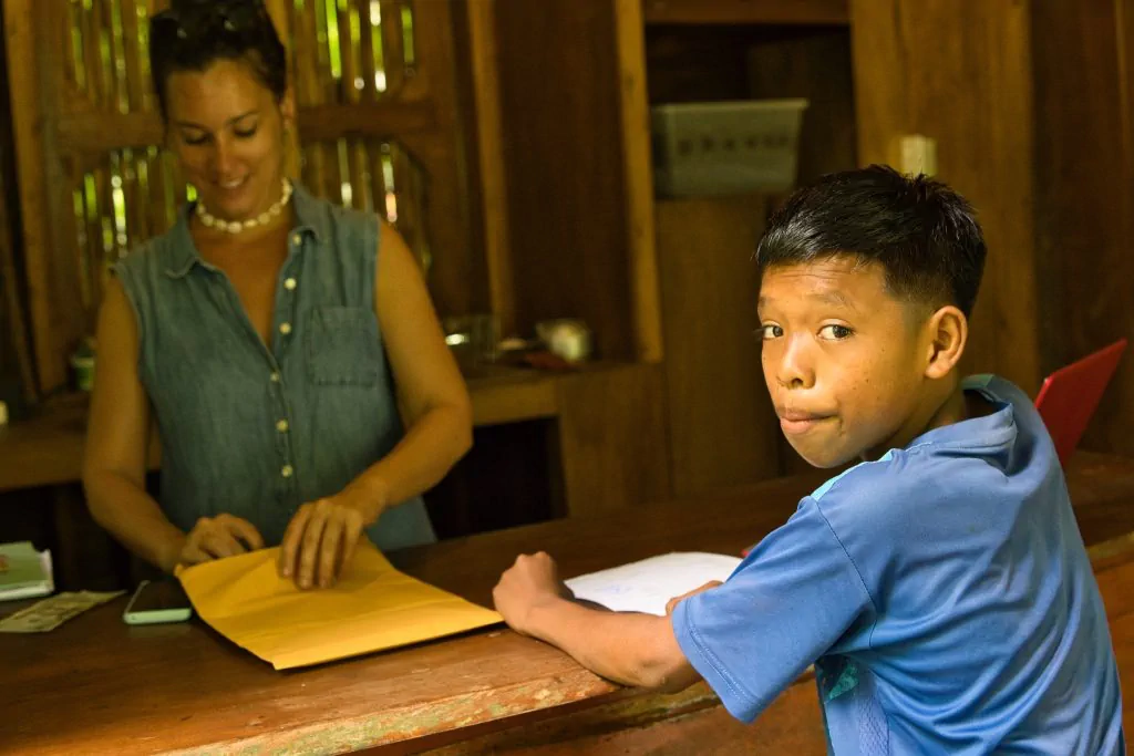 Indigenous student receiving education support at Bahia Honda school in Panama