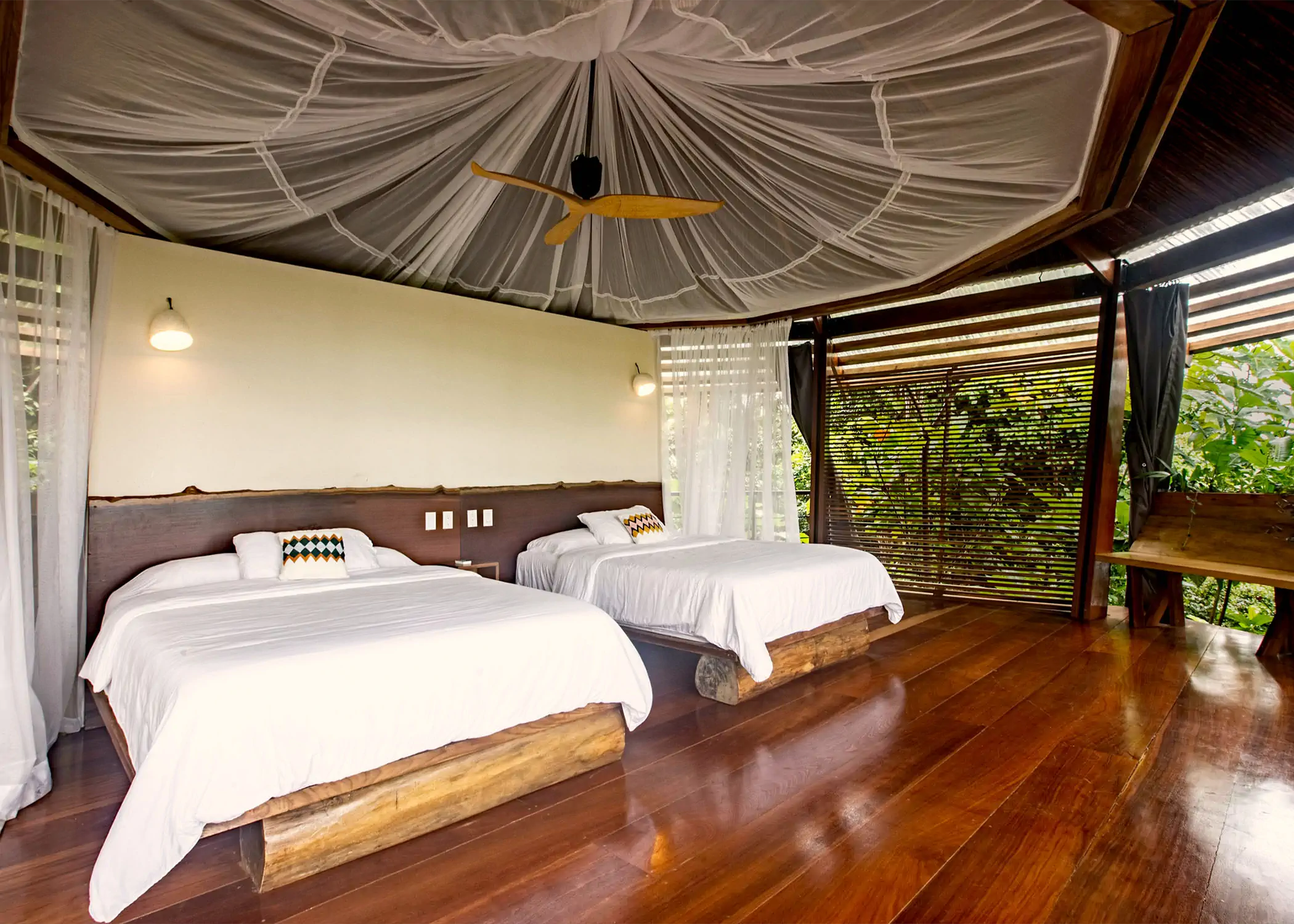 Rainforest Queen Bungalow twin beds with tropical hardwood floors panoramic windows